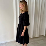 Vestido Negro con Mangas Abullonadas Marella