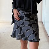 Falda corta gris y negra CACHAREL XS