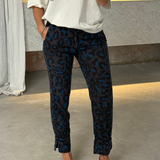 Blue leopard print trousers