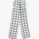 Complete look: white trousers with black checks