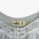 Top tirantes semitransparente con volantes HOLLISTER M
