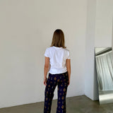 Pantalones lilas estampados Scalpers