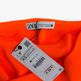 Top multiposición naranja fosforito ZARA XS