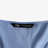 Top azul con botones y manga larga ZARA M