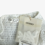 Vestido midi blanco bordado OYSHO S
