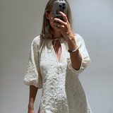 Vestido corto beige con manga abullonada ZARA S