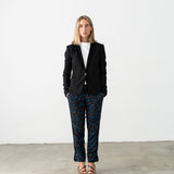 Blue leopard print trousers