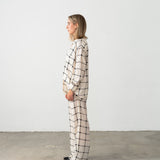 Complete look: white trousers with black checks