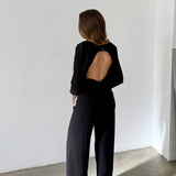 Mono negro con espalda abierta Apparentia Collection