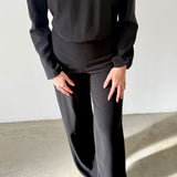 Mono negro con espalda abierta Apparentia Collection