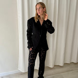Pantalón negro bordado inglés Rotate Birger Christensen