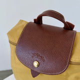 Mochila amarilla Le Pliage Longchamp