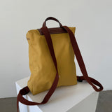 Mochila amarilla Le Pliage Longchamp