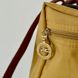 Mochila amarilla Le Pliage Longchamp
