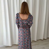 Vestido midi floral fruncido RIXO