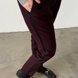 Pantalones de sastrería color ciruela con raya lateral Claudie Pierlot