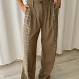 Pantalón gris con paneles en contraste The IQ Collection